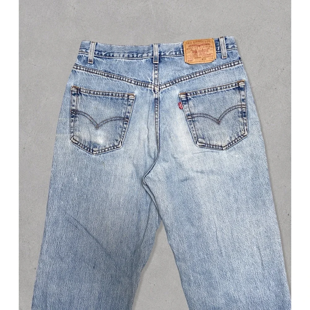 Vintage Levi's 550 Relaxed Fit Jeans Men's Size 34x34 (Fits 32x34) Blue Distress